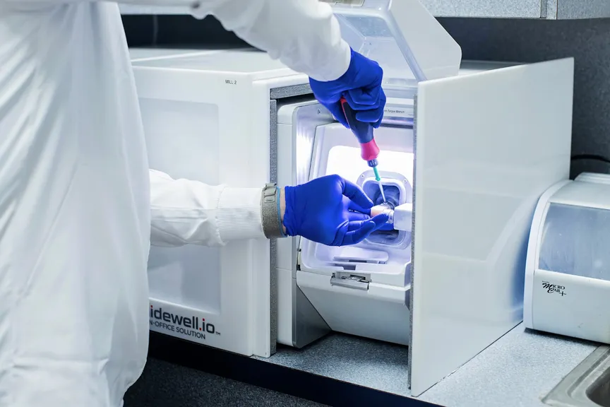 Same-day crown being placed in Glidewell milling machine