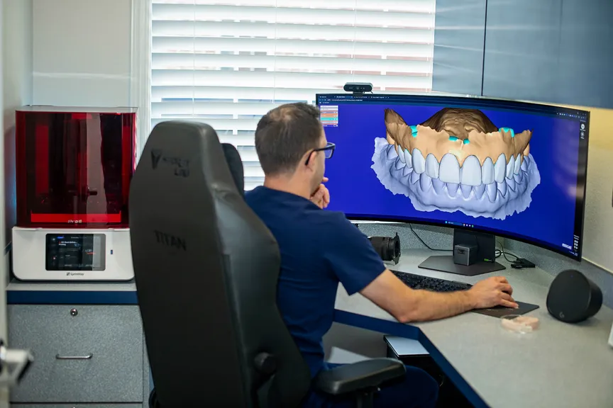 Dr. Prentice using iTero digital scanner for personalized preventive care